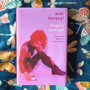 Purple and Red Book 'Fingers Crossed' by Miki Berenyi